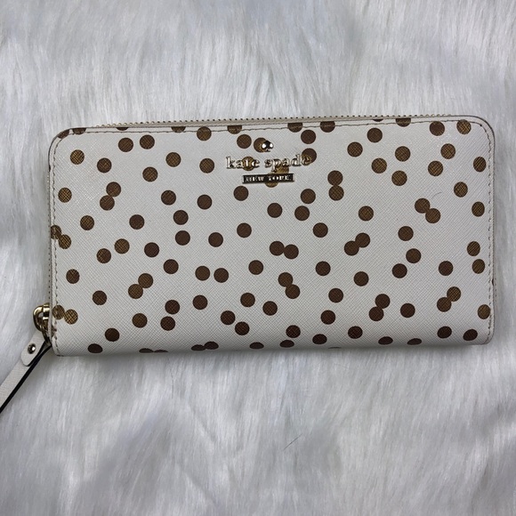 kate spade Handbags - Kate Spade Cedar Street Gold Polka Dot Wallet
